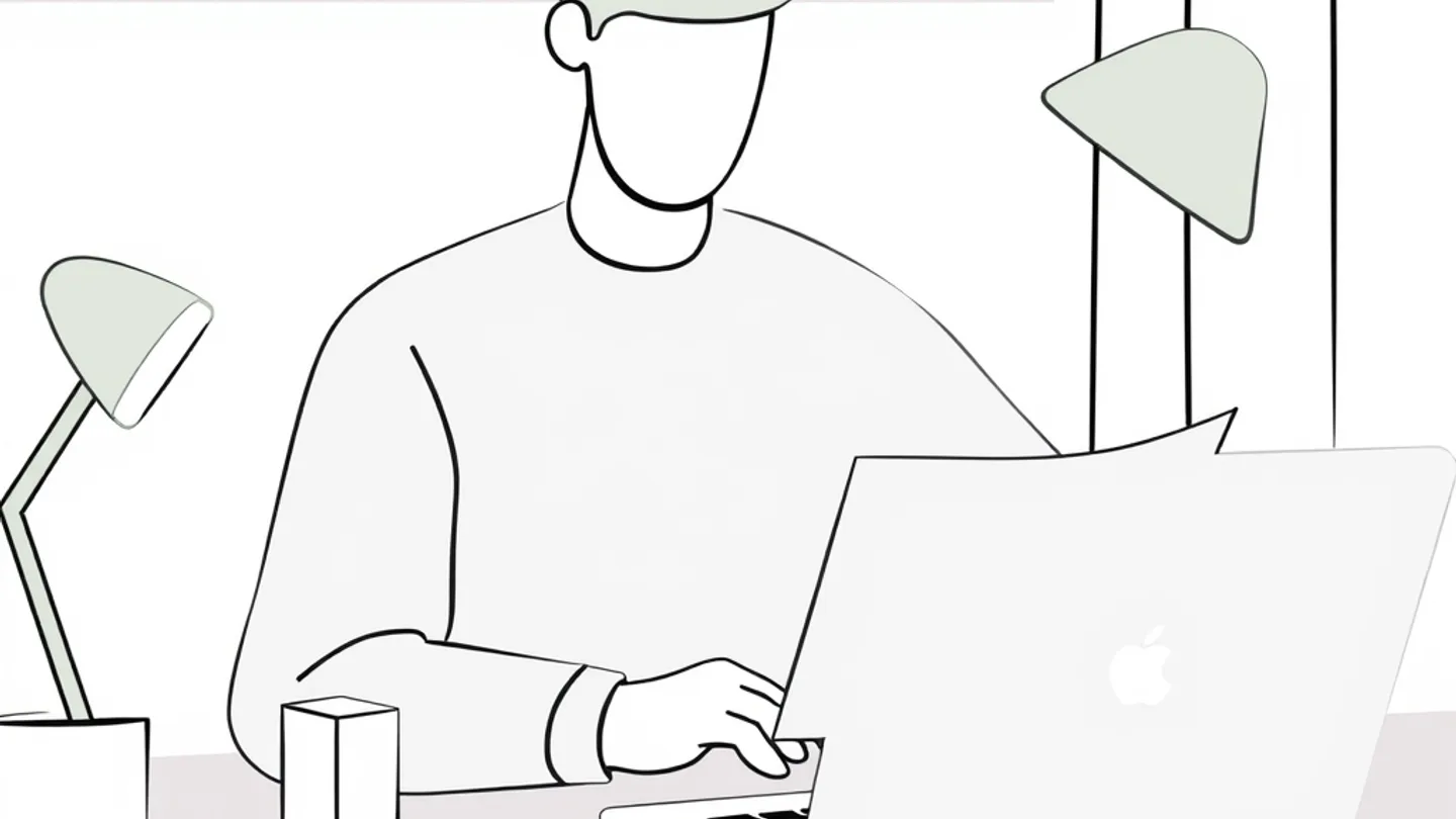 A creator reading a funded campaign brief on a laptop at a desk